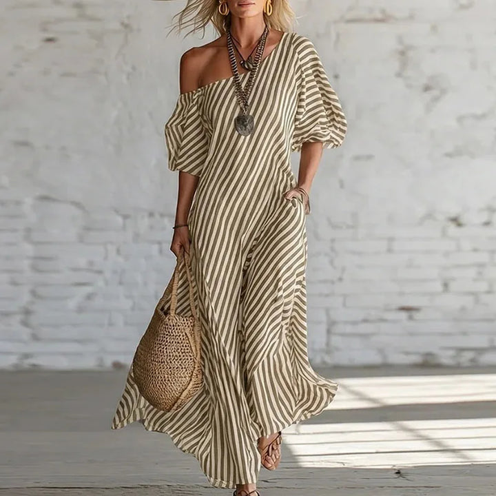 Comfortable & elegant women's one-shoulder puff sleeve midi dress. Flowy fabric, perfect for summer style.