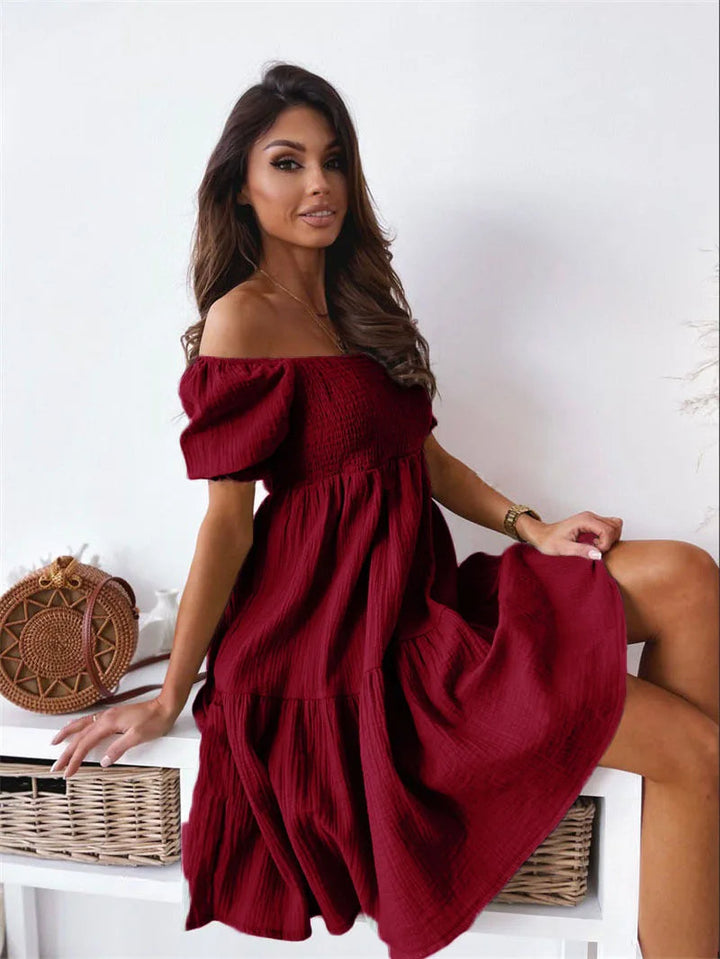 Sleek women's one-shoulder mini dress. Elegant party wear, a-line cut, perfect for summer fashion nights.