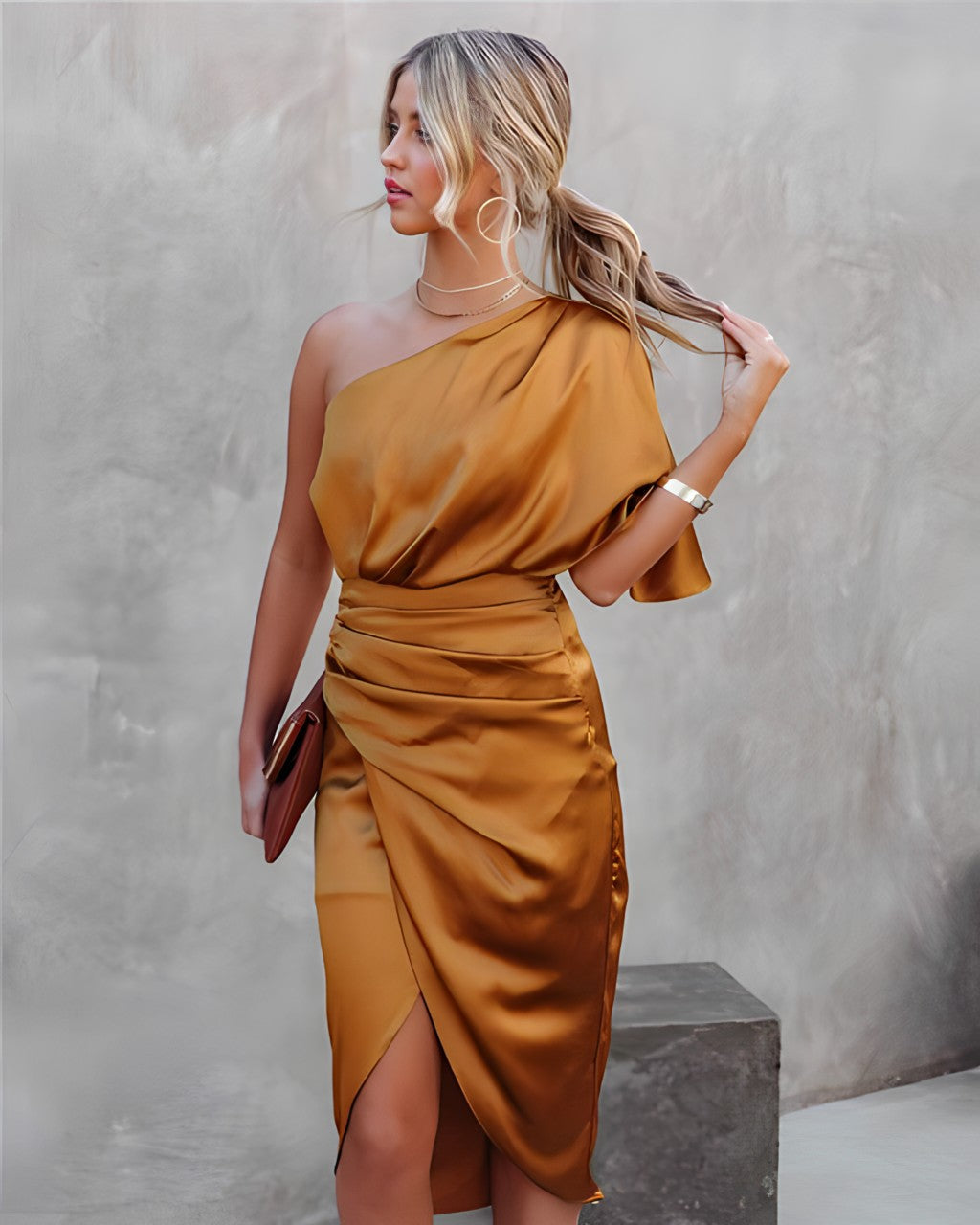 Front view of a women's one shoulder wrap midi dress, showcasing the flattering ruching