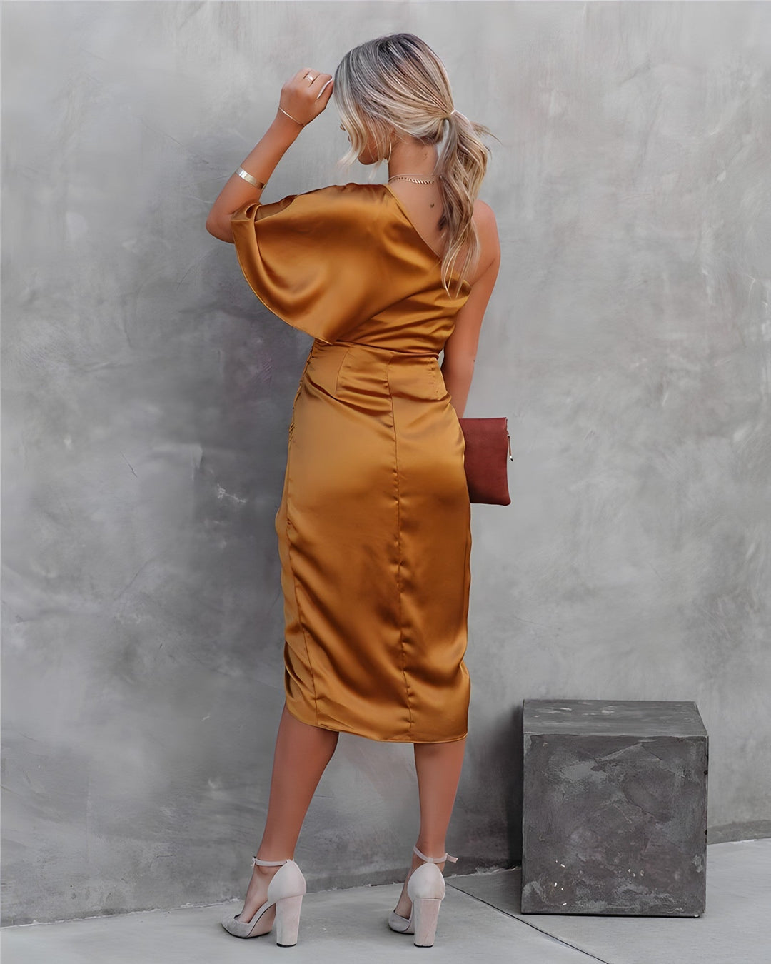 Women's apparel: a versatile one shoulder wrap midi dress, great for formal events