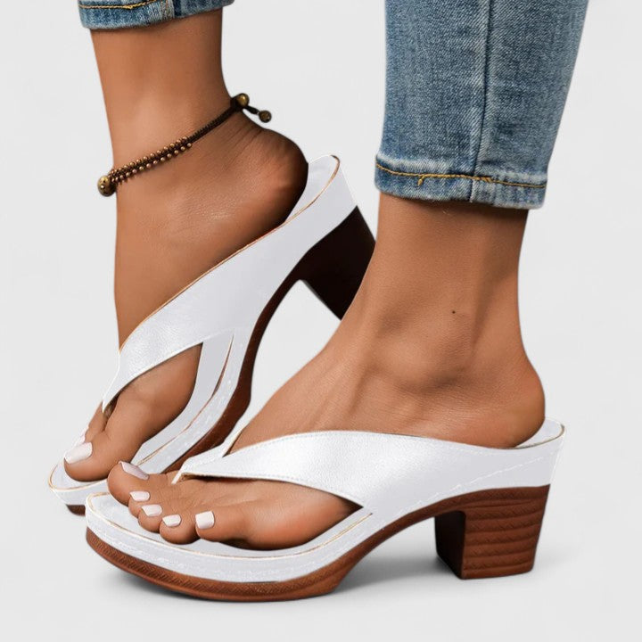 Stylish women's heels with orthopedic comfort. Features arch support, non-slip sole, & ergonomic design for elegant footwear.