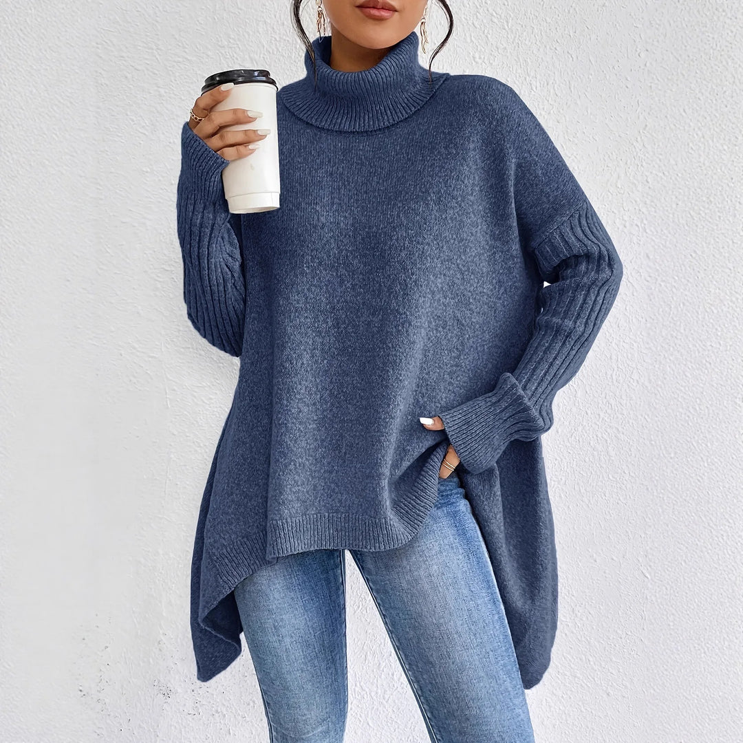 Elegant women's oversized cashmere knit turtleneck sweater in a soft, cozy fabric, perfect for winter fashion.