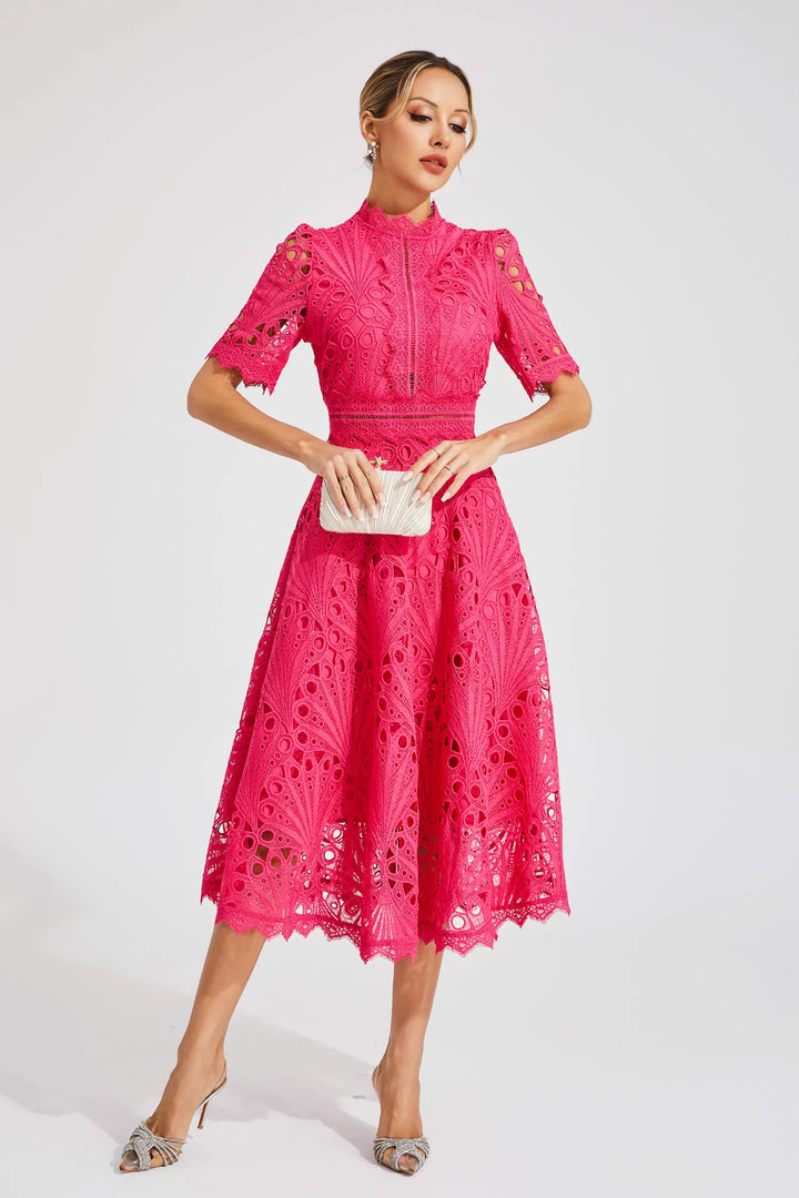 Chic white lace midi dress for women, featuring intricate patterns, ideal as occasion wear.