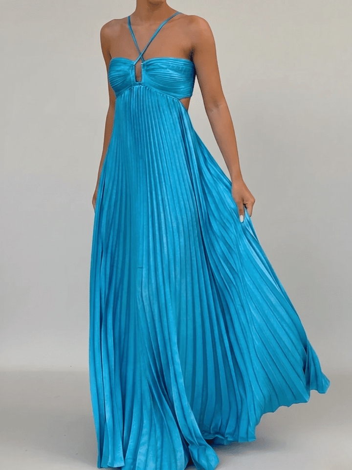 Chic women's strappy pleated maxi dress with A-line silhouette. Offers elegant comfort for any formal or casual event.