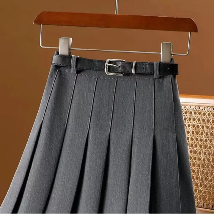 Classic women's A-line midi skirt with elegant pleats, creating a sophisticated and timeless silhouette.