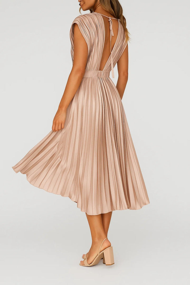 Sophisticated women's deep V-neck pleated midi cocktail dress. Ideal for parties and evening events.