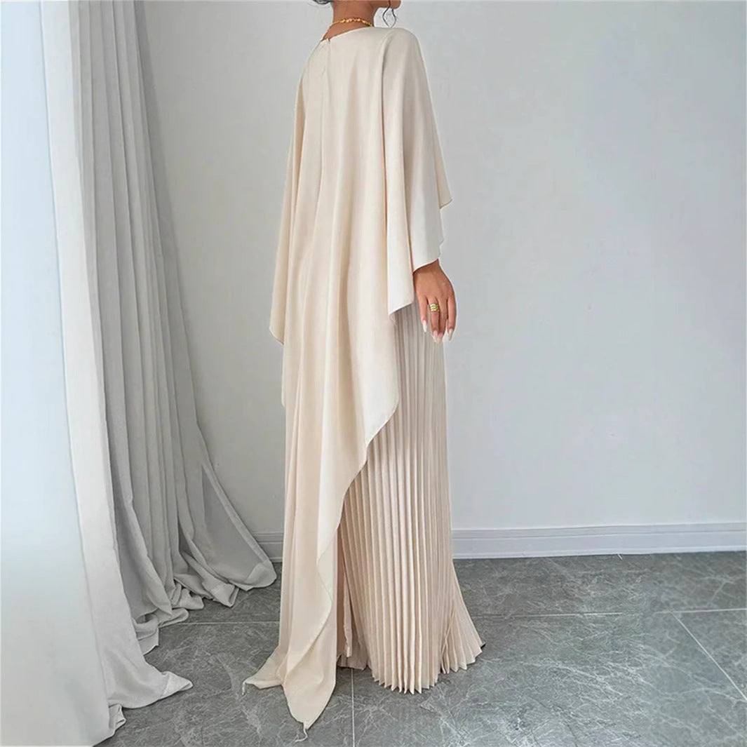 Sophisticated women's pleated maxi dress featuring a chic cape overlay, ideal for modest and elegant occasion wear.