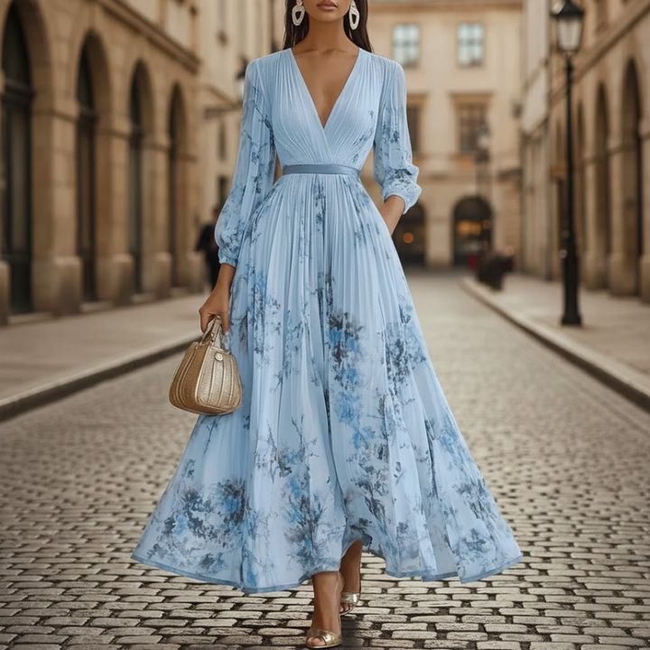 Women's elegant V-neck maxi dress featuring delicate floral print and graceful pleats, perfect for any occasion.