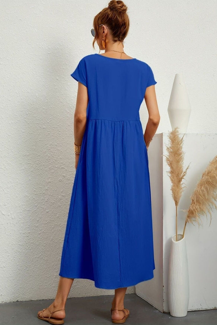 Women's party dress: elegant pleated midi design, versatile for any chic occasion.