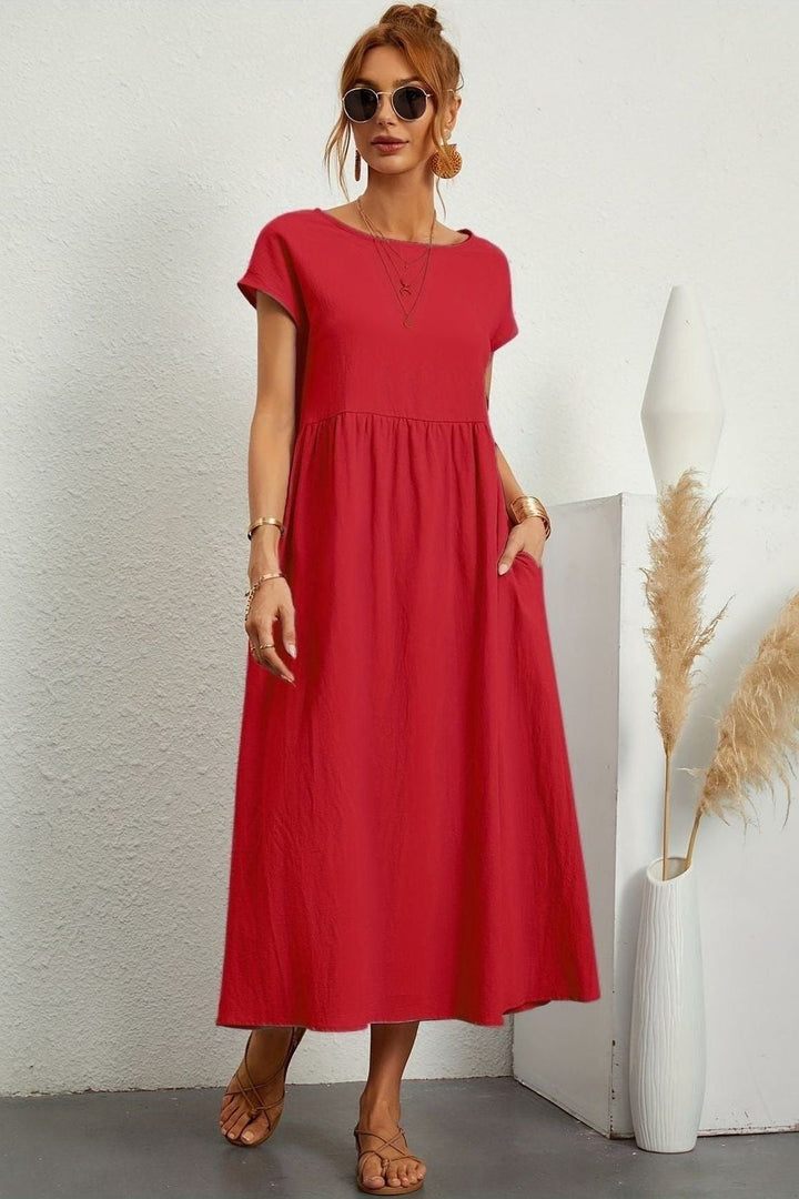 Beautiful women's midi dress. Pleated design for an elegant, versatile look and feel.