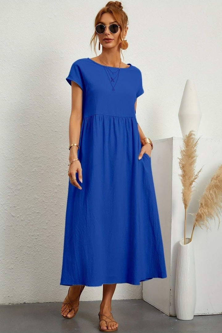Chic pleated midi dress for women, offering effortless style for any elegant occasion.