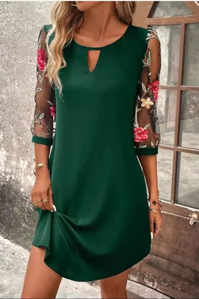 Elegant women's pleated midi dress, perfect for wedding guests or cocktail parties. Sophisticated formal wear.