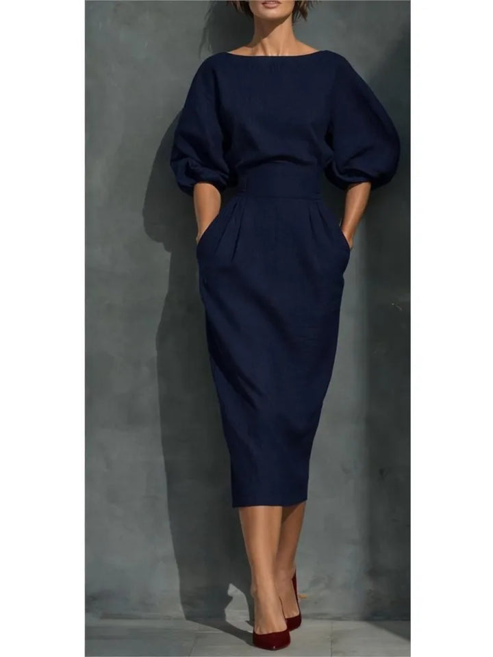 Versatile women's midi dress: elegant pleated design, lantern sleeves, & cinched waist. Great for office, cocktail, or spring wear.