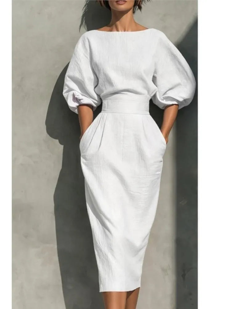 Stylish women's pleated midi dress with comfortable lantern sleeves & a flattering cinched waist for elegant office wear.