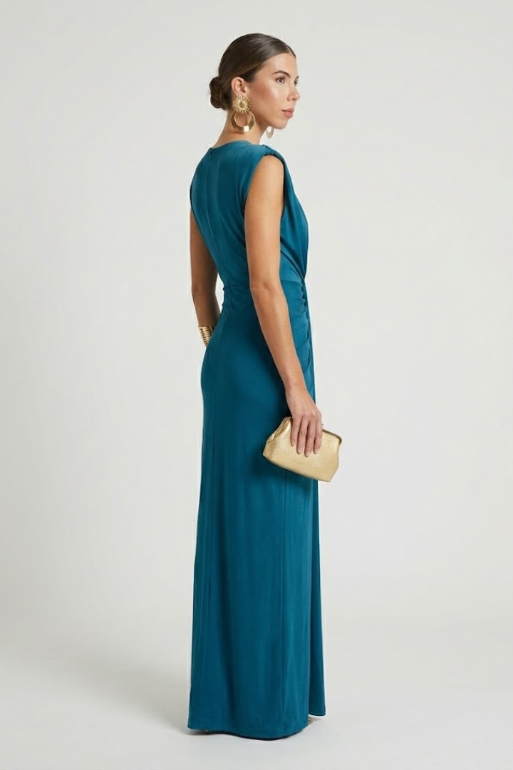 Elegant women's V-neck sleeveless pleated maxi dress, showcasing fabric and pleat details.