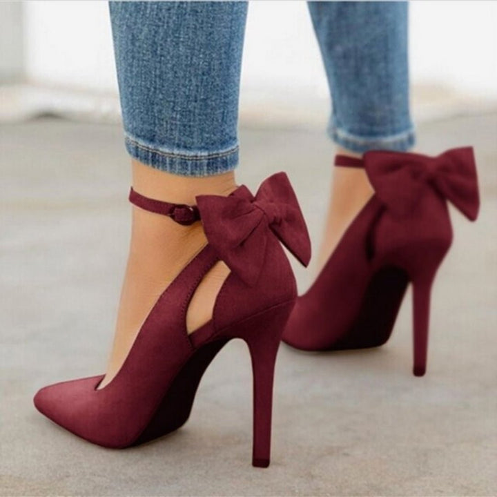 Elegant women's pointed toe high heel court shoes with delicate bow detail, perfect for formal events.