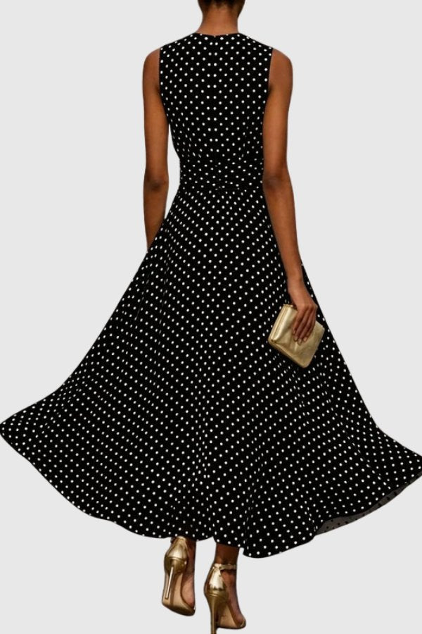 Graceful women's polka dot evening dress, a sleeveless maxi with a beautiful ruffle hem.