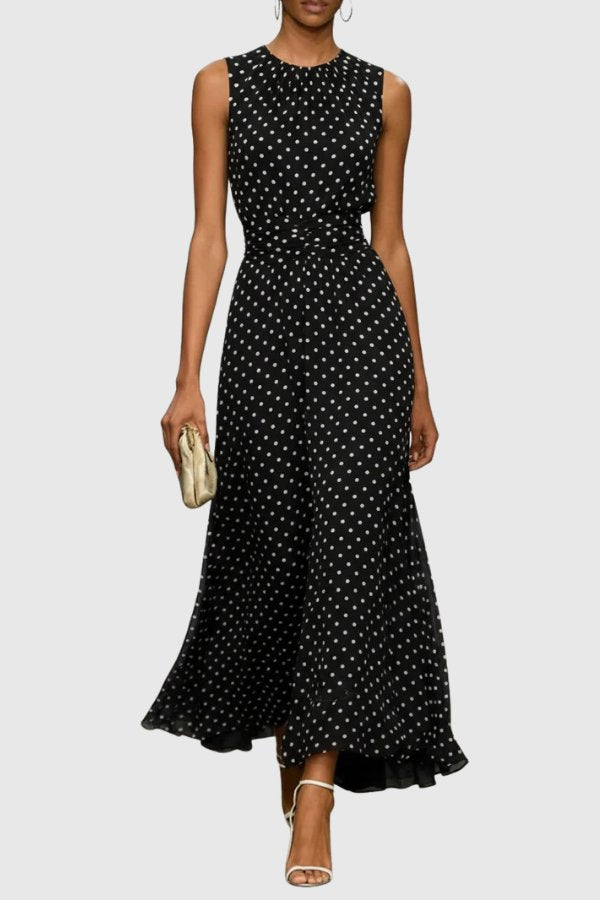 Chic women's occasion wear: polka dot maxi dress featuring elegant ruffle hem & sleeveless design.