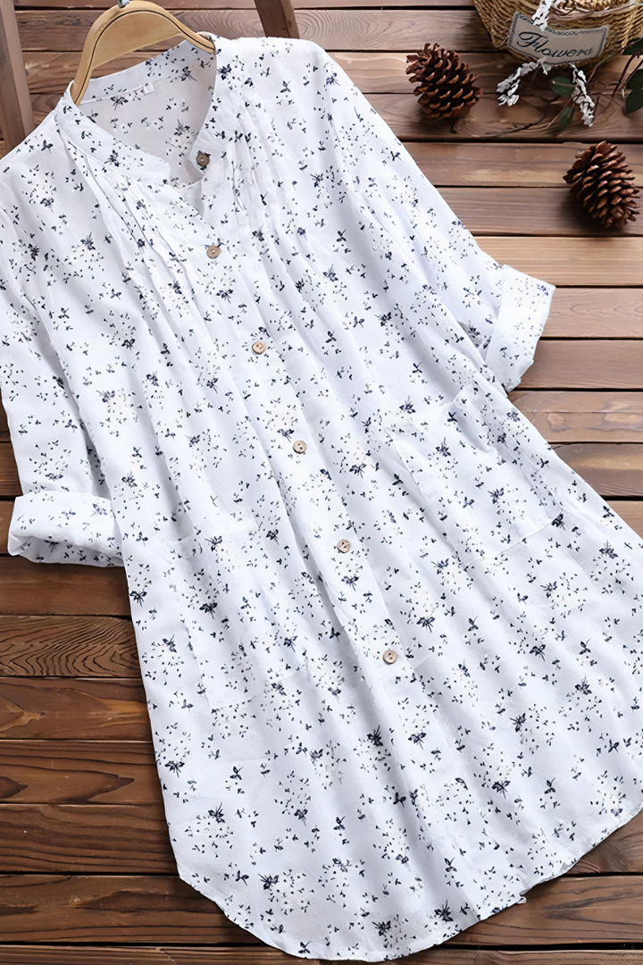 Elegant women's printed long sleeve blouse. Relaxed fit top, perfect for stylish office wear or casual everyday fashion.