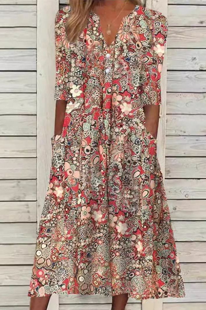 Elegant women's printed midi dress, perfect for sophisticated casual or semi-formal occasions.