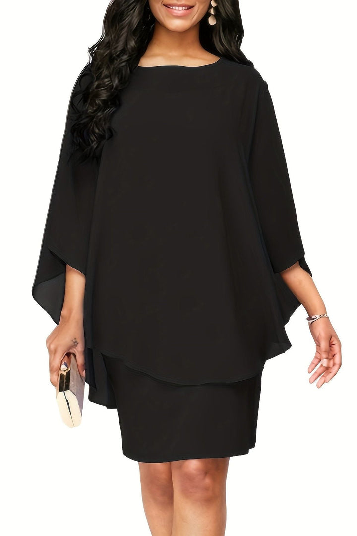 Comfortable & flattering women's relaxed fit midi dress with elegant print, ideal for effortless summer style.