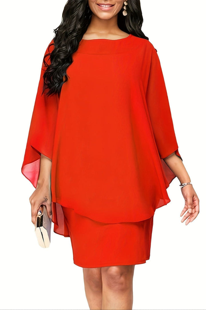 Women's midi dress featuring a vibrant print and relaxed fit, offering flattering, comfortable, and elegant style.