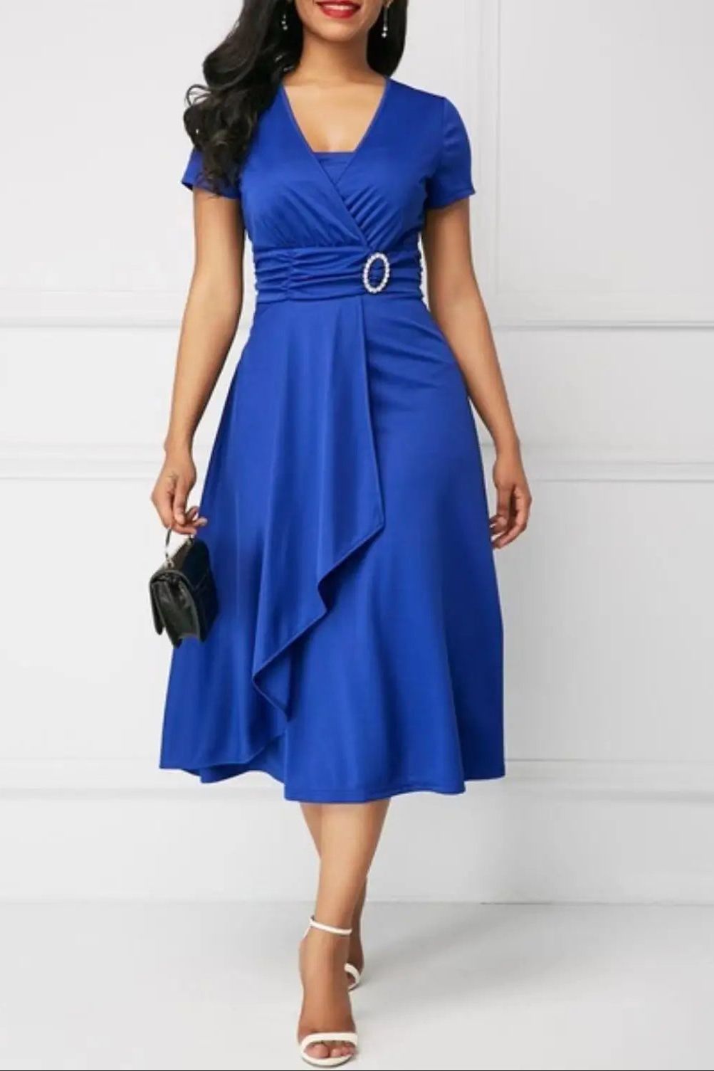 Stylish women's printed midi dress, a flattering and comfortable choice for summer parties & timeless elegance.