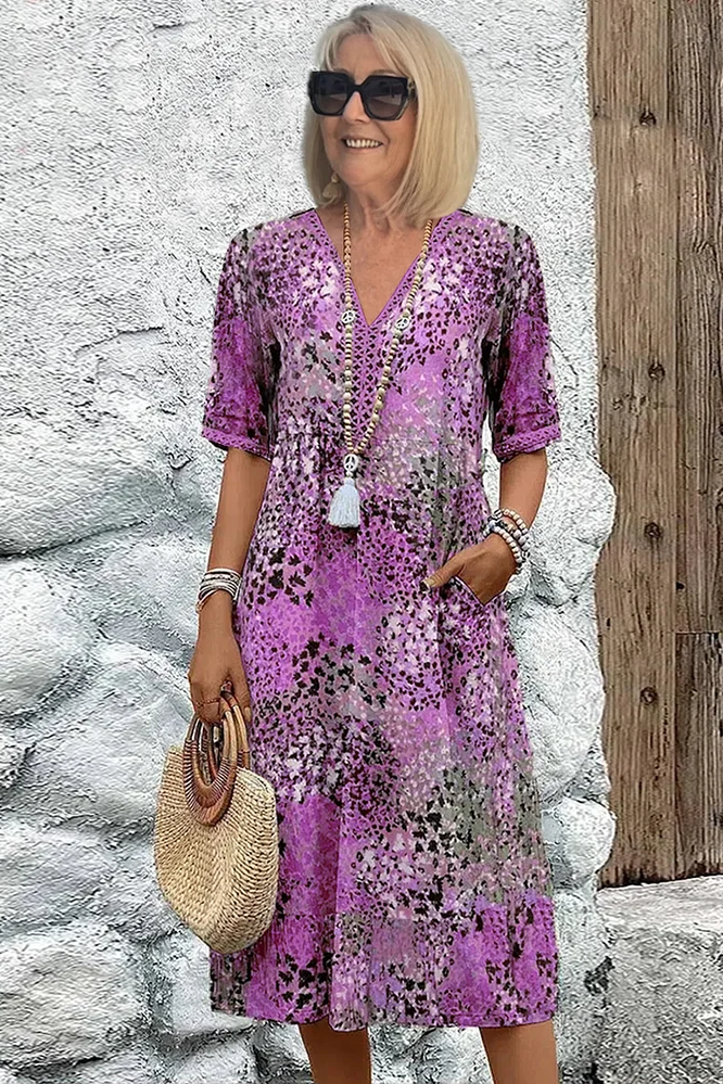 Lightweight women's printed midi dress, a comfortable and elegant choice for spring and summer fashion.