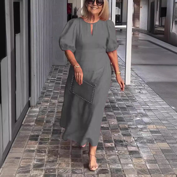 Stylish women's puff sleeve midi dress, a chic and versatile apparel for spring & summer fashion.