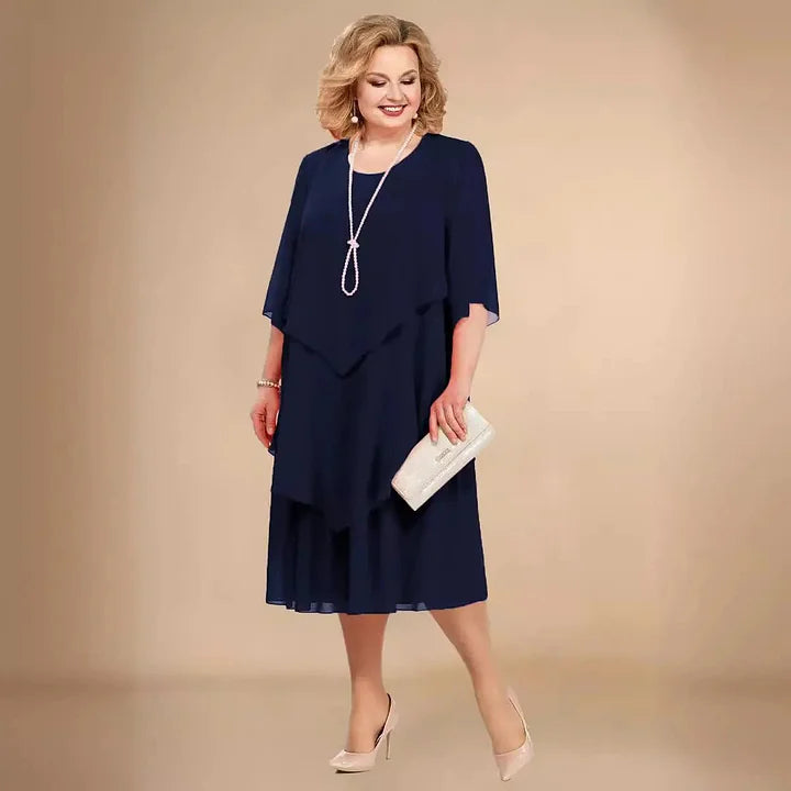 Stylish navy women's A-line midi dress. Versatile 3/4 sleeve, round neck design. Perfect for parties & special occasions.