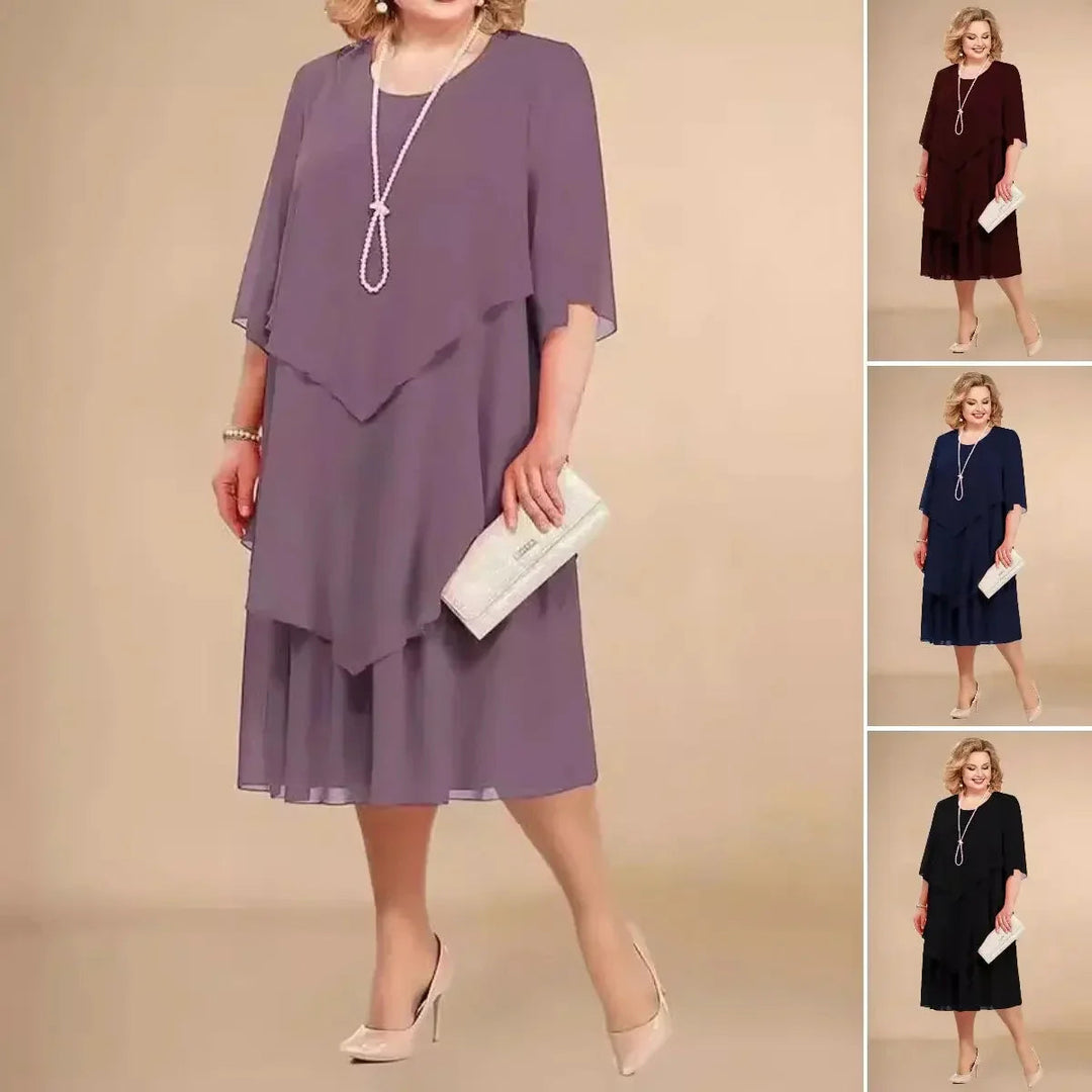 Sophisticated women's A-line midi dress. Elegant 3/4 sleeve, round neck. Perfect as a party or formal occasion dress.