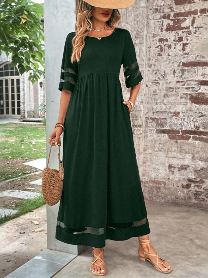 Red women's elegant round neck maxi dress. Versatile short sleeve design with a gathered waist for a flattering fit. Day to night.
