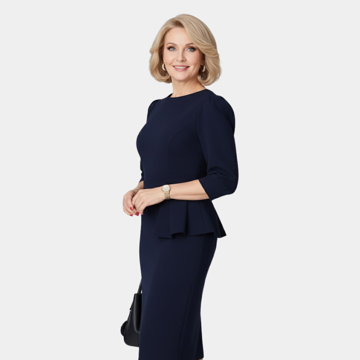 Chic women's peplum ruffle dress, ideal as a versatile cocktail or workwear piece, flattering for all occasions.