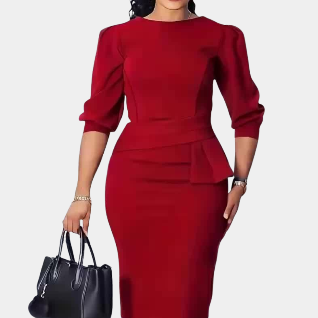 Sophisticated fall/winter women's dress, with elegant ruffles and a flattering peplum waist, ideal for work to evening.