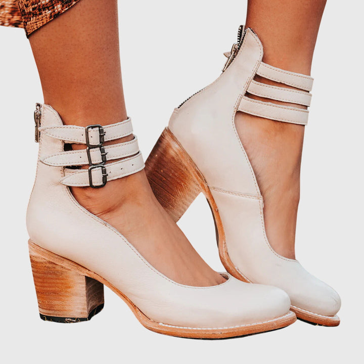 Dressy women's sandals for elegant summer events & all-day comfort. Stylish open-toe footwear.