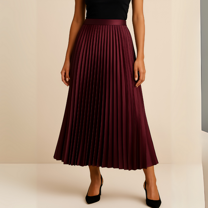 Flowy satin midi skirt for women, featuring elegant pleats and a flattering high-waist design.