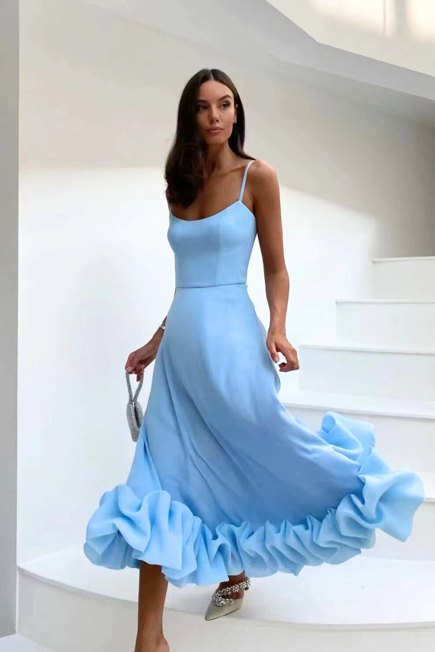 Formal women's party dress, elegant scoop-neck maxi with spaghetti straps and a stylish ruffle hem.
