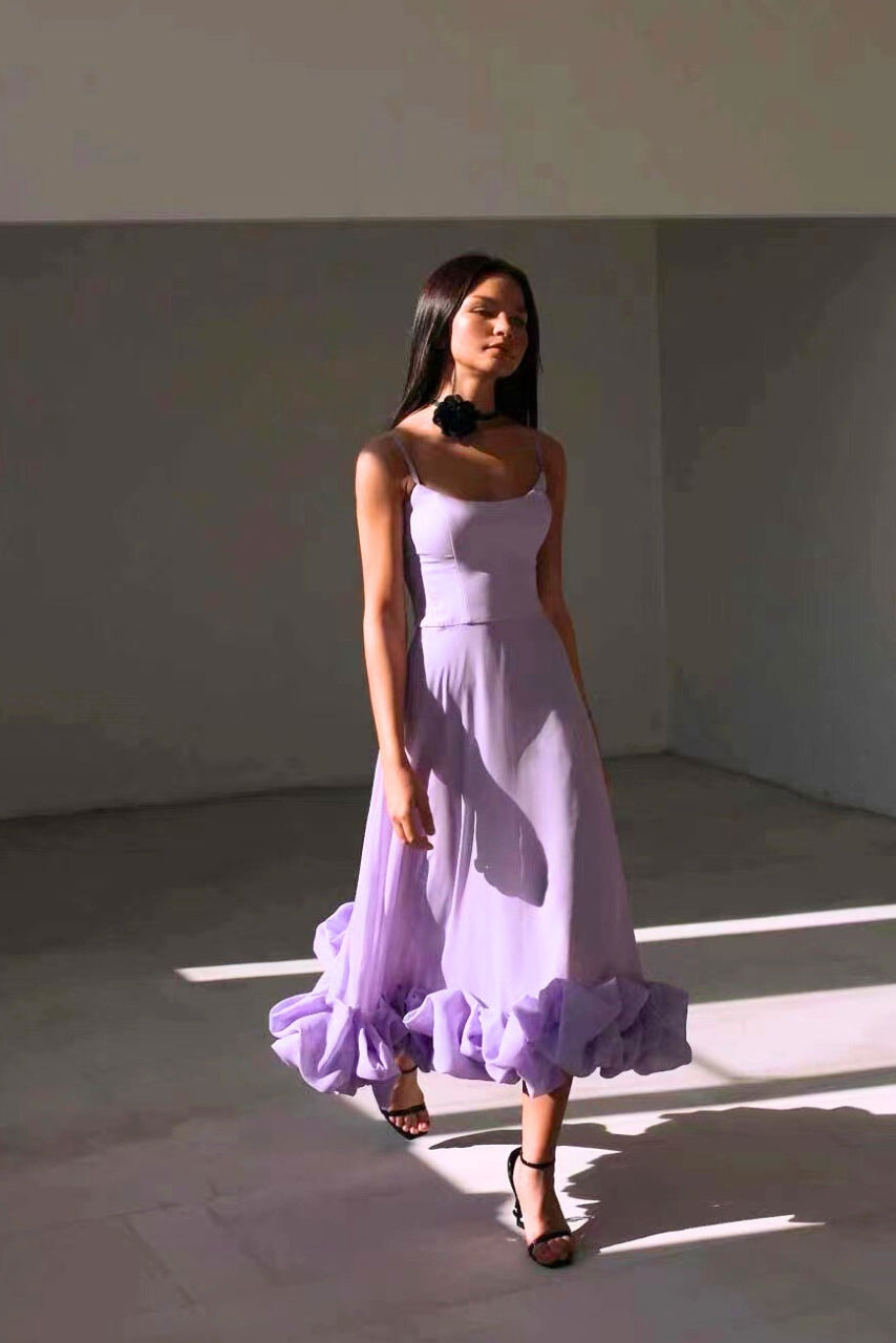 Sophisticated women's long evening dress, scoop neck, spaghetti straps, and ruffle hem, great for weddings.