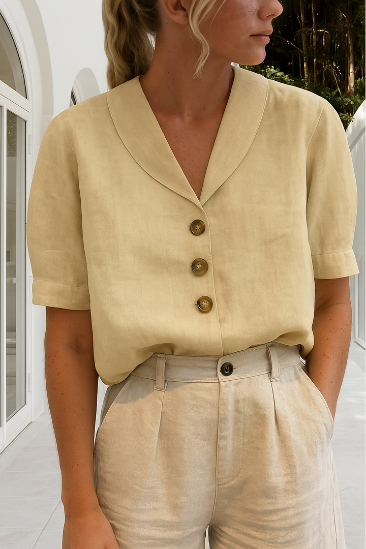 Versatile women's short sleeve V-neck blouse with button-up front, ideal for workwear, office or a stylish summer outfit.