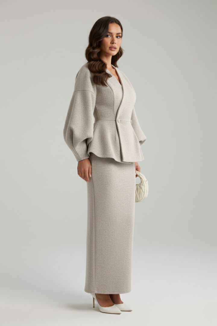 Stylish women's business skirt suit, including a sophisticated V-neck blazer and tailored skirt for formal events.