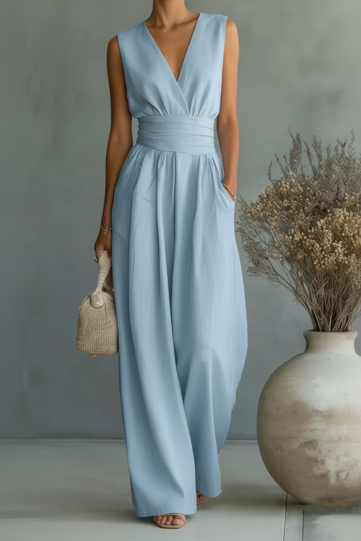 Tailored women's two-piece cross waist duo set in blue, a chic alternative for contemporary professional fashion.