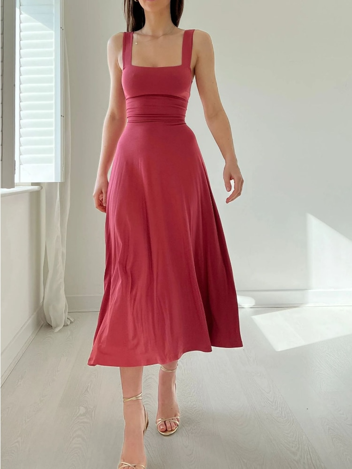 Women's sleeveless A-line midi dress. Elegant, comfortable, and flattering for versatile casual or evening wear.