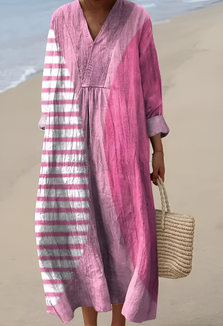 Elegant Women's sleeveless abstract print V-neck flowing midi dress in colorful hues, perfect for summer casual elegance. On sale.