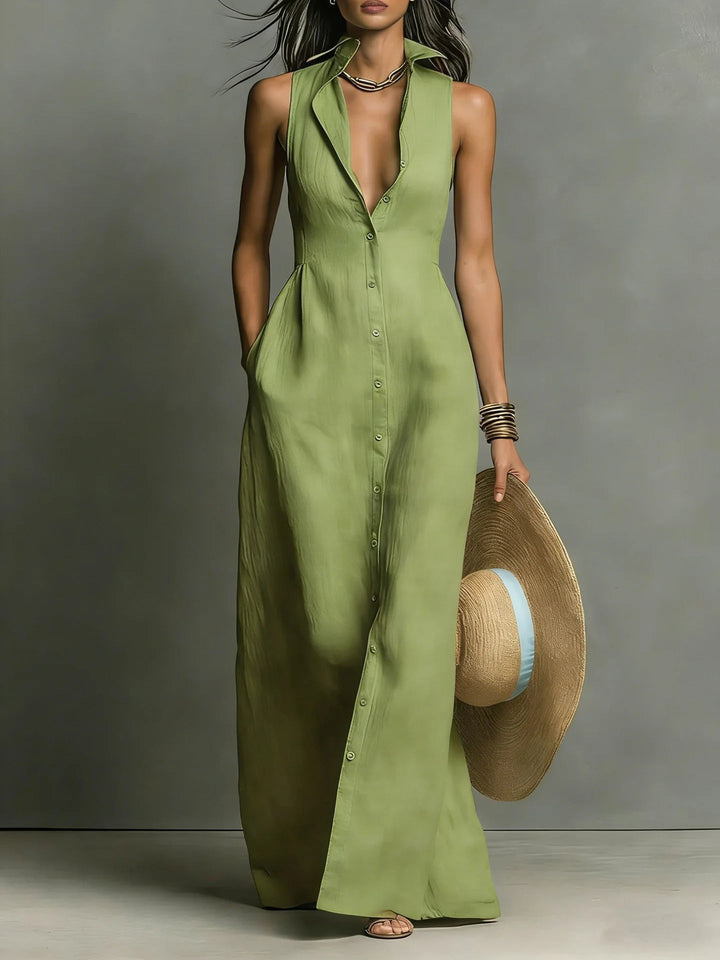 Women's long maxi dress with elegant button-front & lapel collar. Versatile sleeveless shirt dress for summer.
