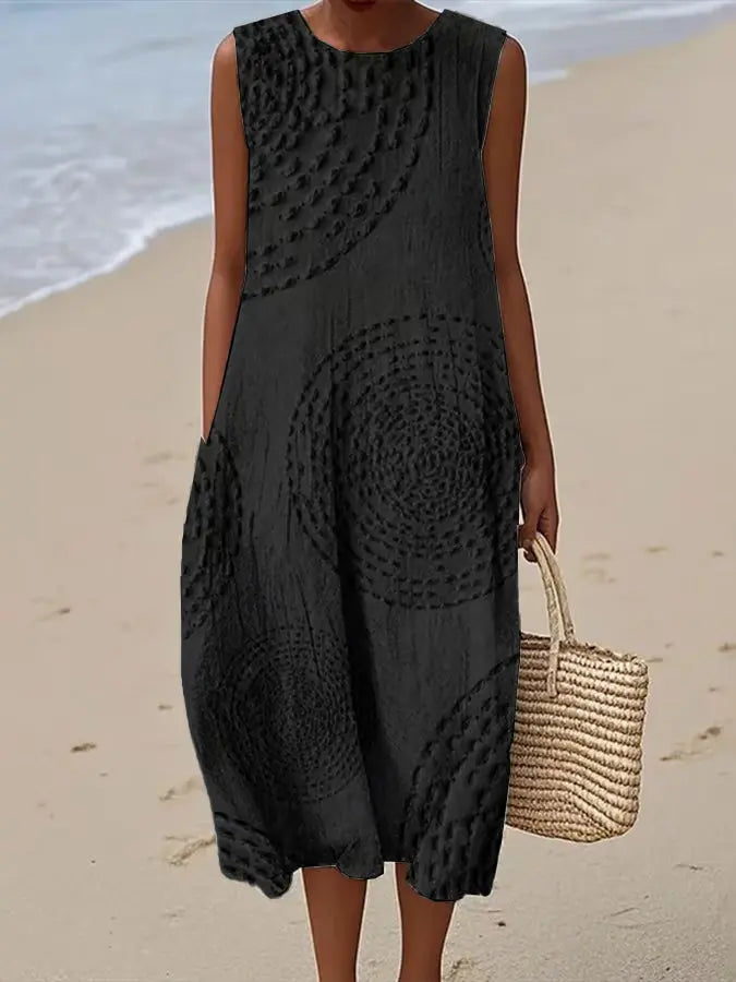 Beautiful embroidered floral midi dress for women, sleeveless and flowy, ideal for elegant day or summer casual events.