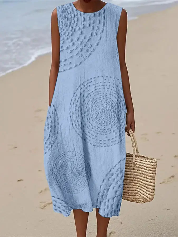 Comfortable flowy A-line midi dress for women, sleeveless with delicate embroidery, an elegant choice for summer days.