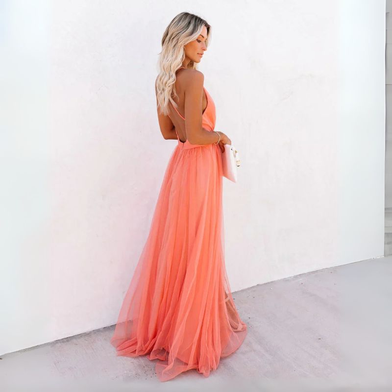 Beautiful orange sleeveless V-neck maxi dress for women. A perfect formal wedding guest or special occasion gown.