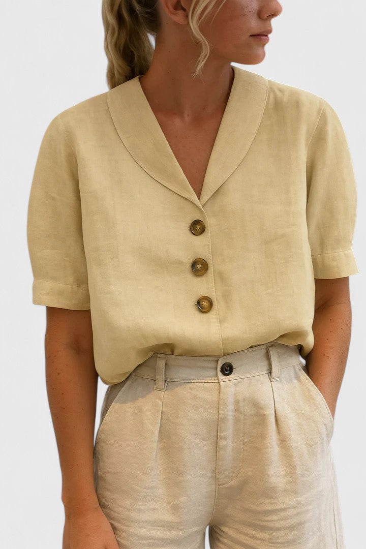 Elegant women's sophisticated button-up blouse, perfect for professional wear or casual chic spring & summer style.