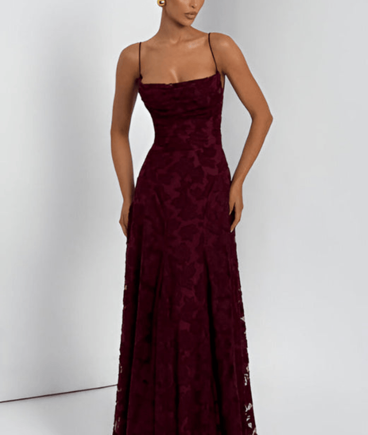 Elegant women's spaghetti strap A-line maxi dress, perfect for evening or summer parties.
