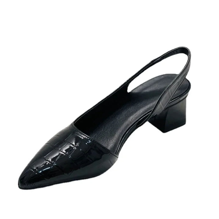 Women's formal footwear: black elegant block heel pumps, versatile for office or special events.